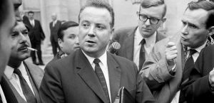 (FILES) This file photo taken on May 26, 1968 shows Georges Seguy (C) General Secretary of the French Union CGT answering journalists questions during the "Grenelle negociations" in Paris 26 during the events of May-June 1968, which started as a student revolt, culminating in mass workplace occupations and a general strike of some 10 million workers. Georges Seguy, secretary general of the CGT from 1967-1982, died aged 89 on August 14, 2016 the CGT announced. / AFP PHOTO / UPI / STF / FRANCE ONLY